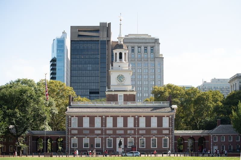 The red-brick Independence Hall with its white clock tower and steeple
